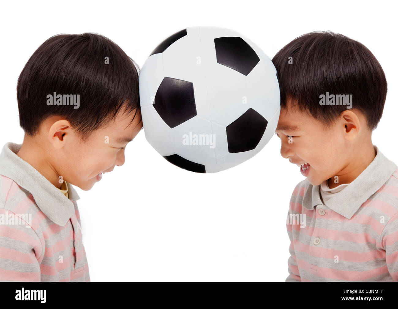 Kids playing football head hires stock photography and images Alamy