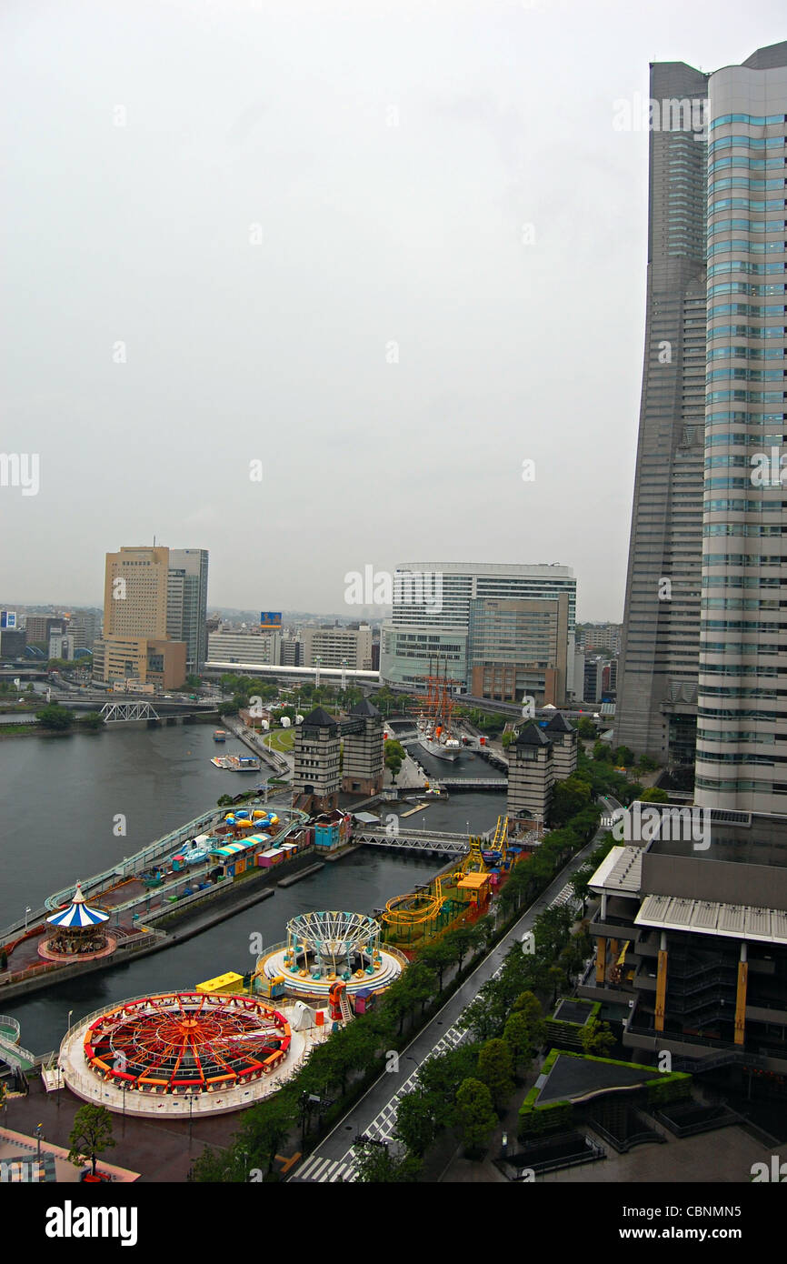 Cosmo World Amusement Park and the Landmark Tower, Minato Mirai, Yokohama, Japan Stock Photo