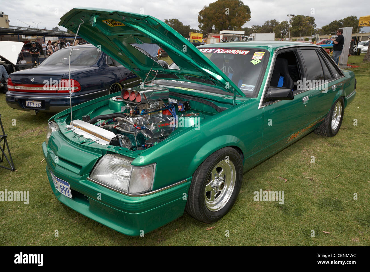 Heavily modified and customised Australian Holden Commodore on display at an outdoors Aussie car show. Stock Photo