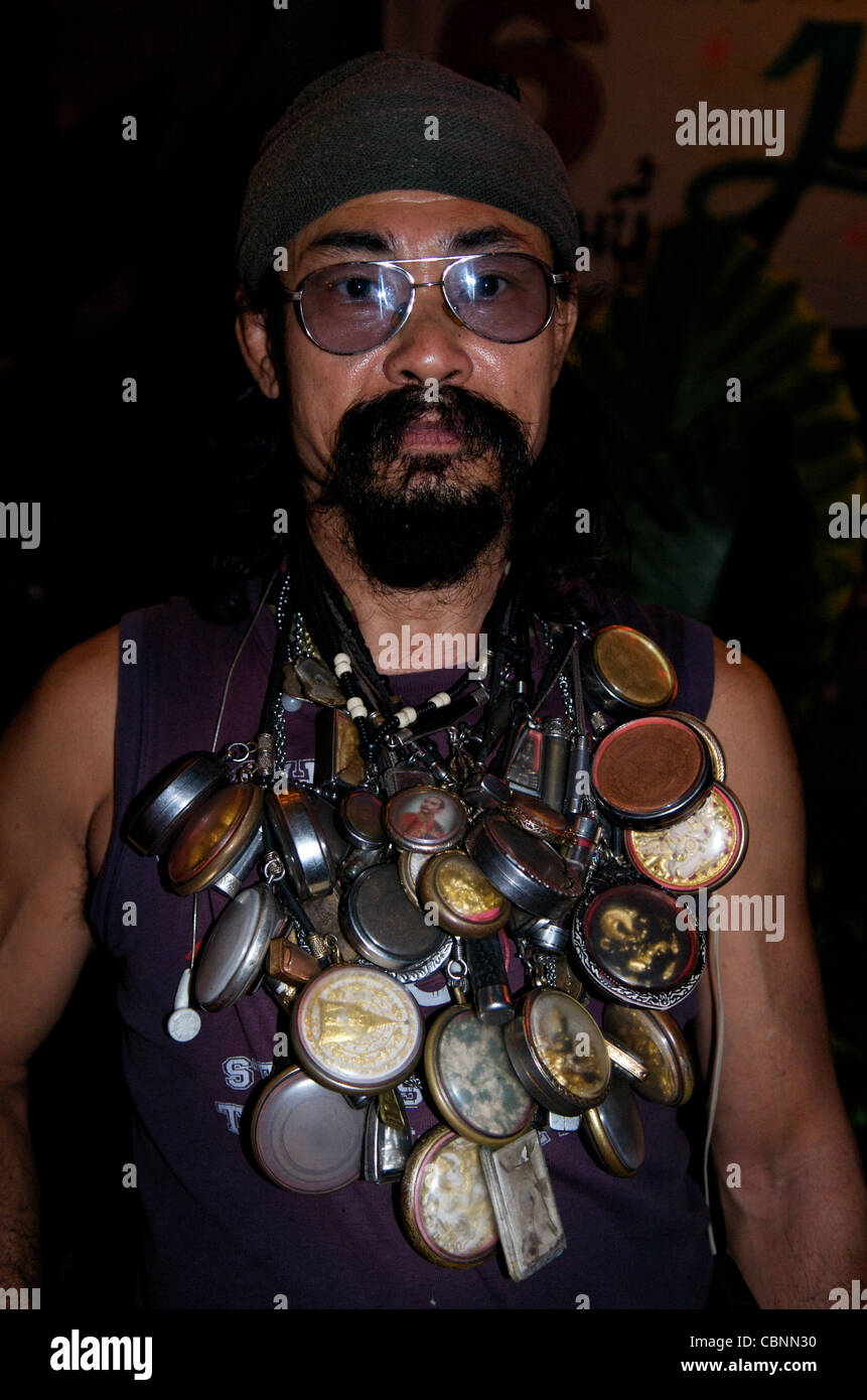 Carabao roadie w/ Buddha amulets (Thailand's best known folk / rock band),  Bangkok, Thailand. credit: Kraig Lieb Stock Photo - Alamy