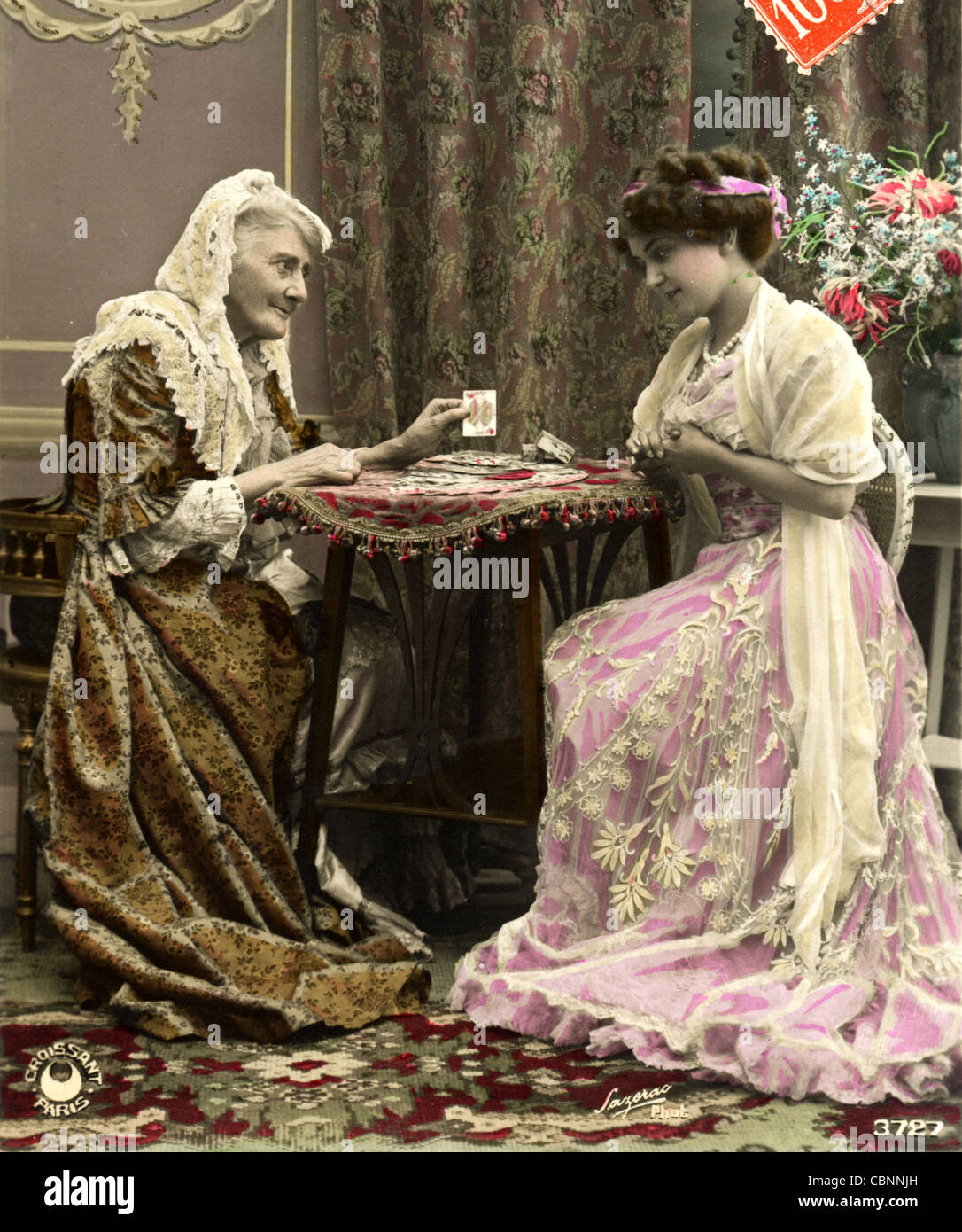 Old Gypsy Fortune Teller Tells Young Beauty's Fortune Stock Photo - Alamy