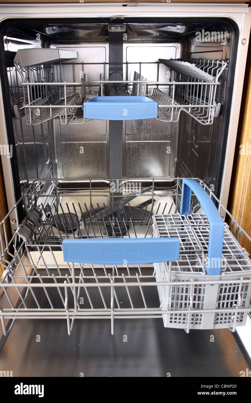 open dishwasher without dishes in kitchen Stock Photo Alamy