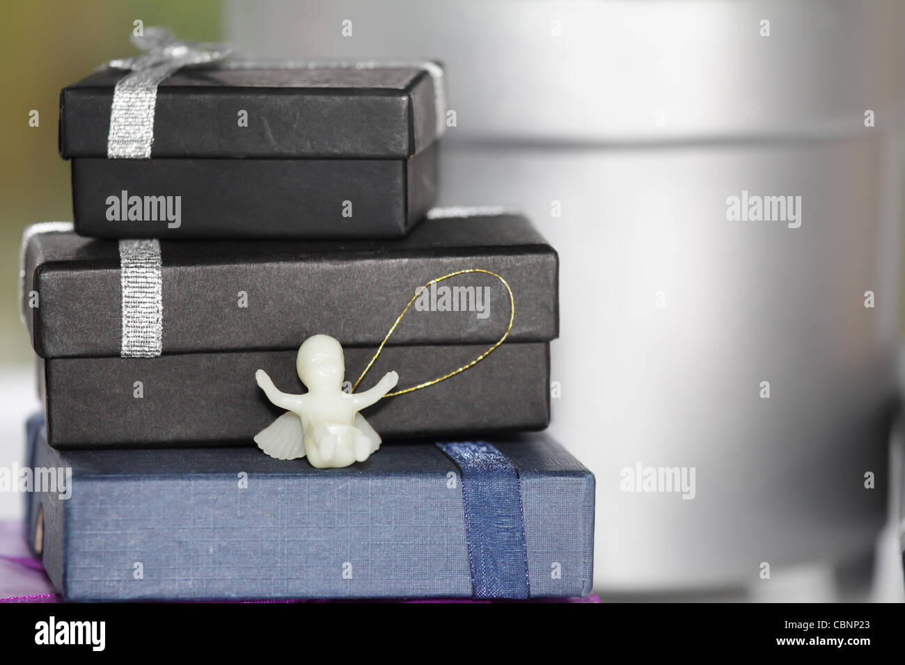 A Baby Angel with Gifts Stock Photo - Alamy