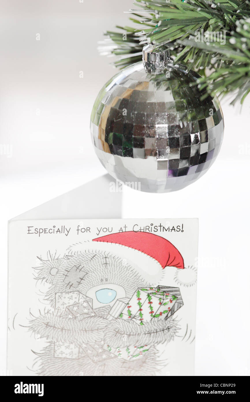 A Cute Christmas Card, Ornament, Silver Ball and Fibre Optic Christmas Tree Stock Photo