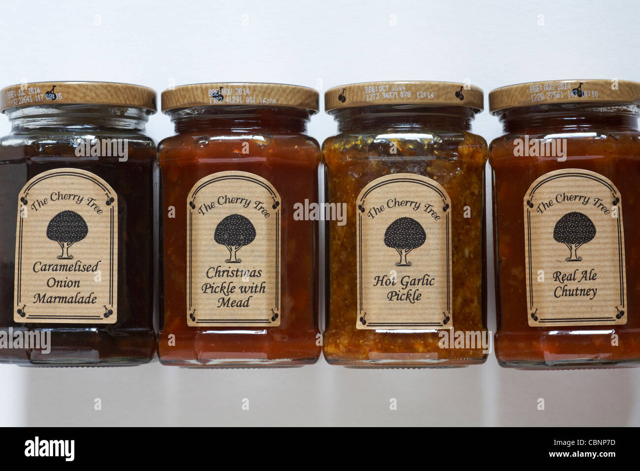 Selection of jars of chutney, pickle and marmalade caramalised onion