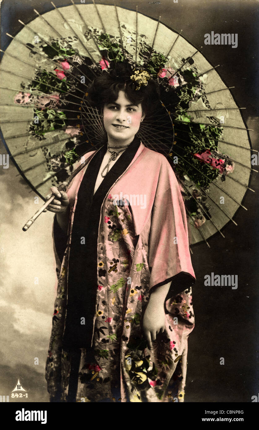 European Beauty in Japanese Kimono with Parasol Stock Photo