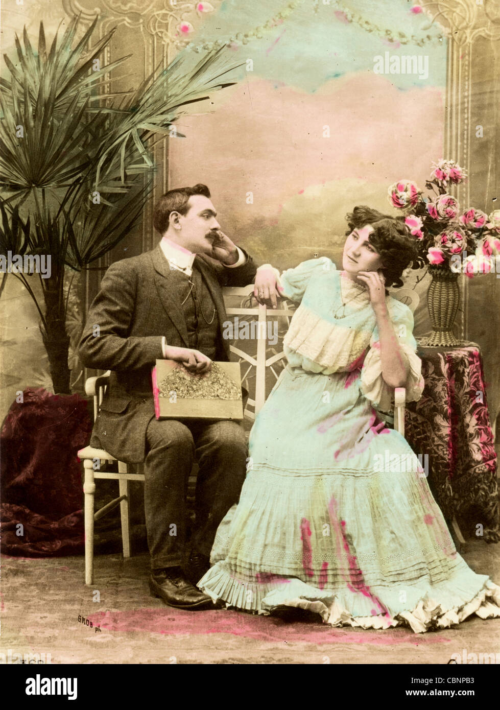 Bored 1900s Couple Sitting Together Stock Photo