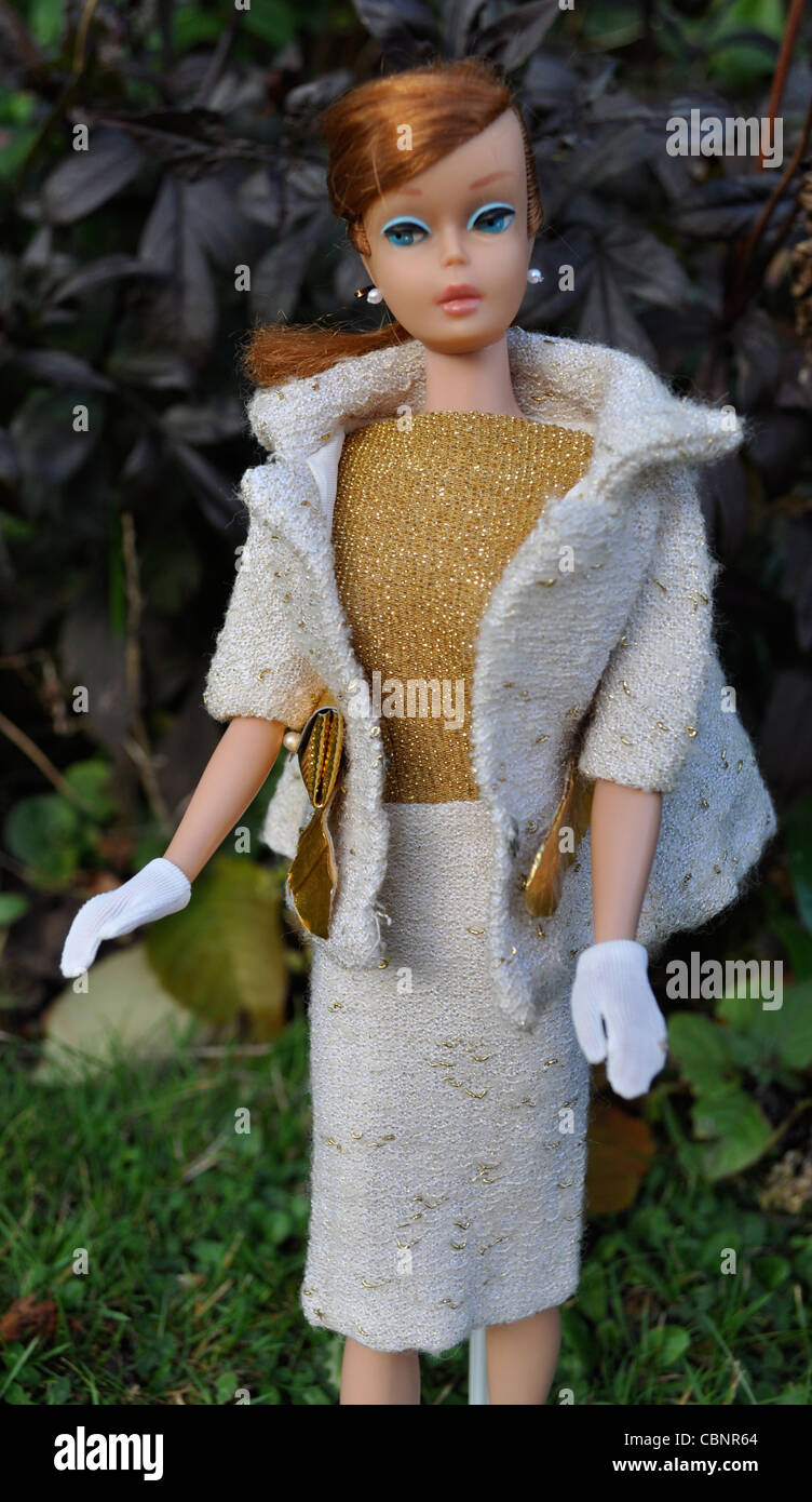 Vintage titian swirl ponytail Barbie doll by Mattel 1963 wearing classic 1960s fashion ensemble, On the Avenue. Collectible. Stock Photo