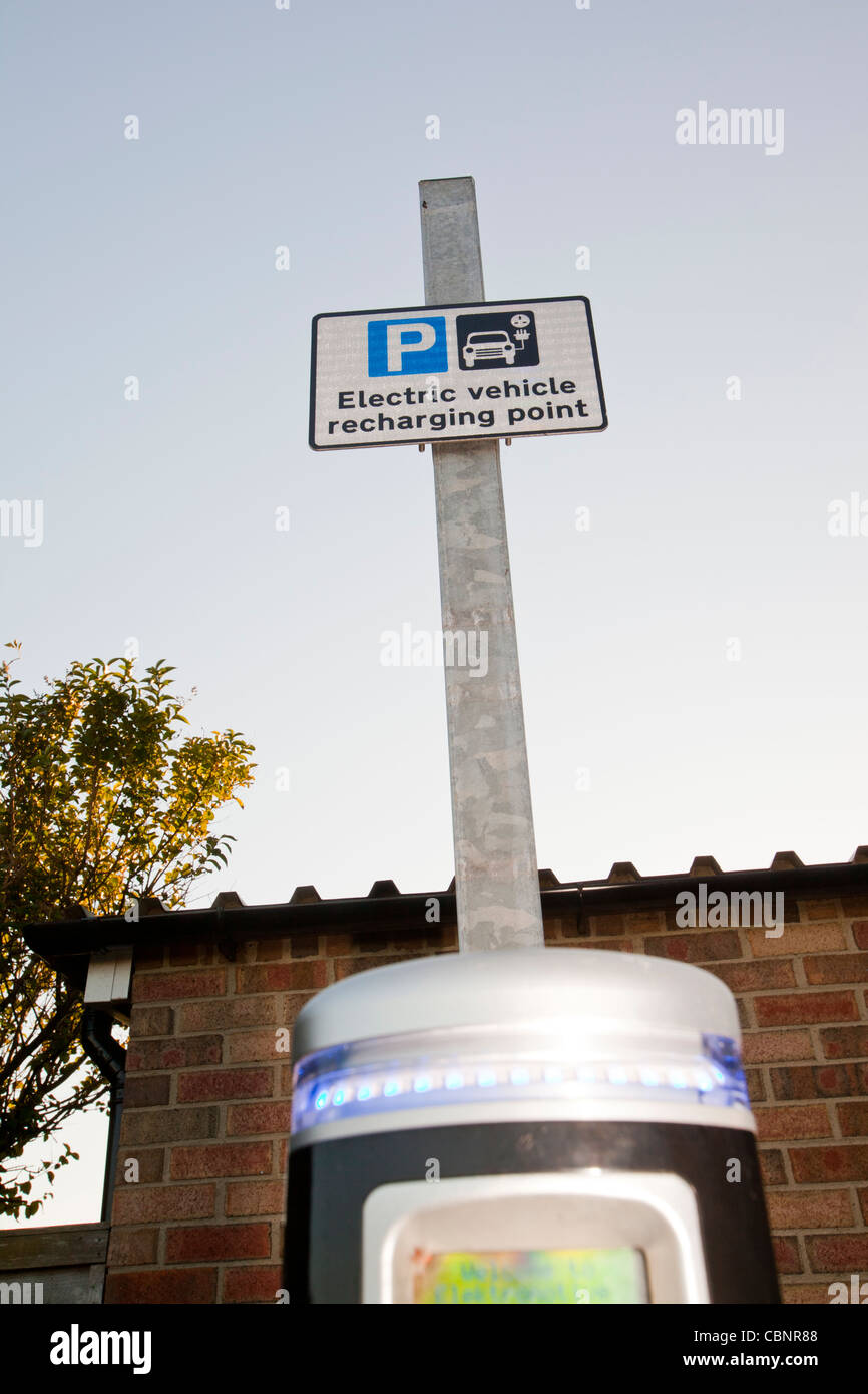 An electric car charging station in a car park near Whitburn, NE, UK. Stock Photo