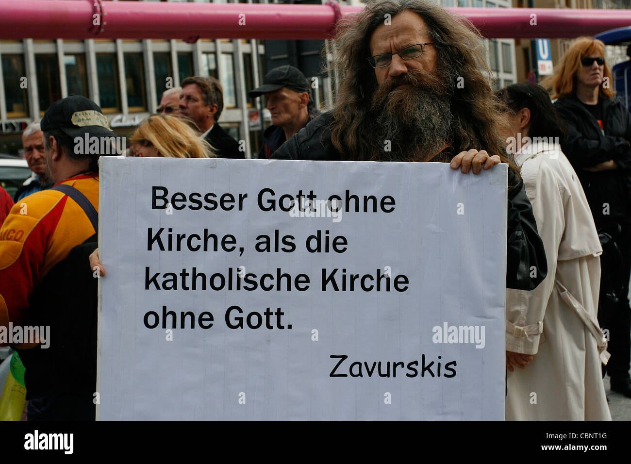 Conviction of a protester against the pope visit in Berlin 2011: 'Better god without church than Catholic Church without god.' Stock Photo