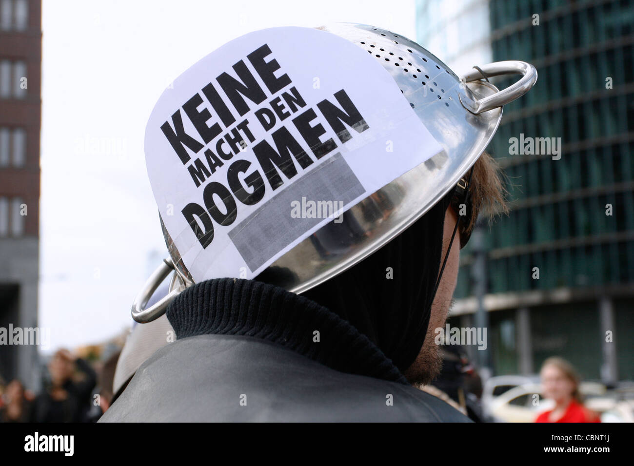 'No power to the dogmas' is written the creative hat of a protester against the visit of Pope Benedict XVI in Berlin, Germany. Stock Photo