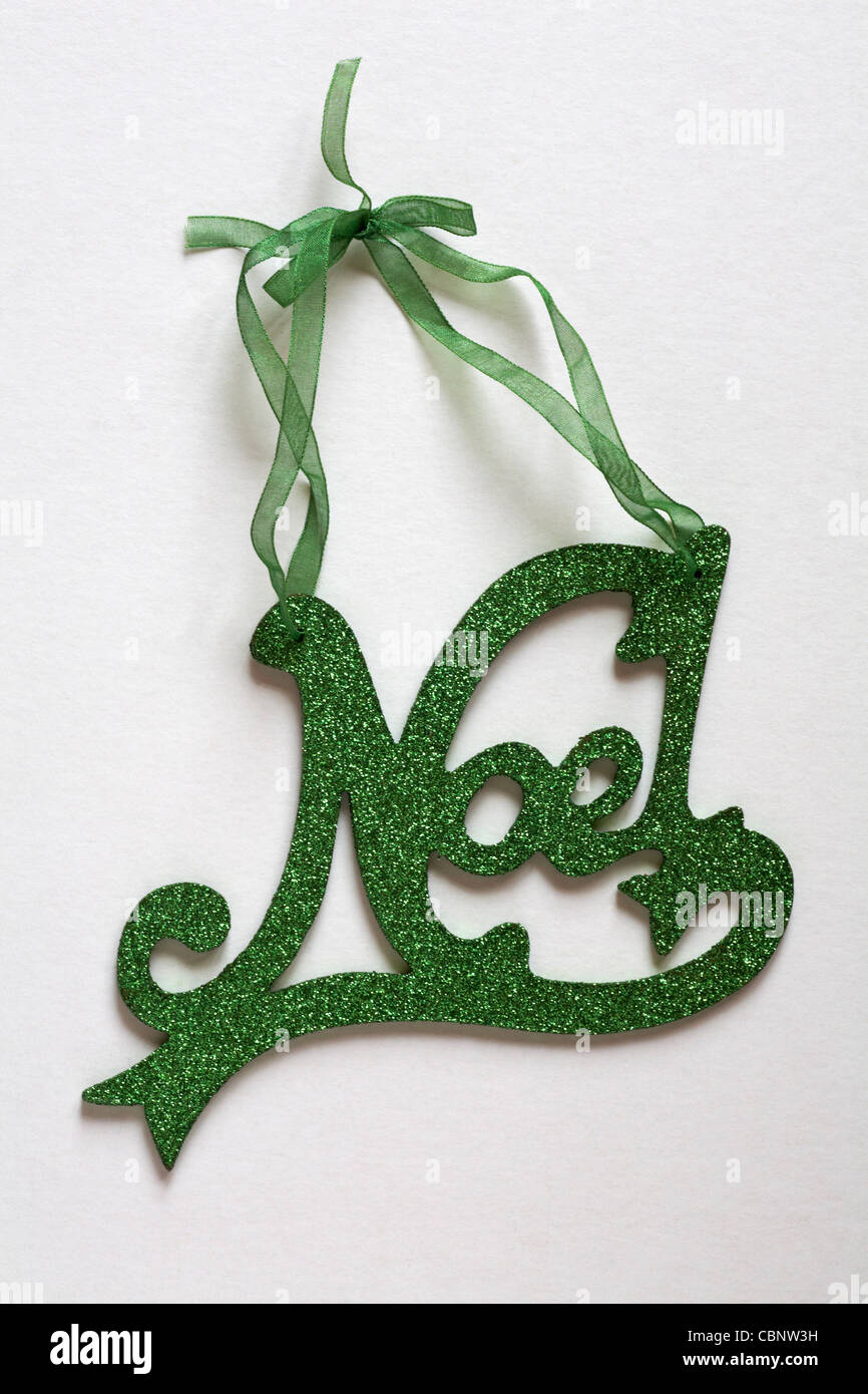 Green glittery Noel Christmas hanging decoration isolated on white background Stock Photo