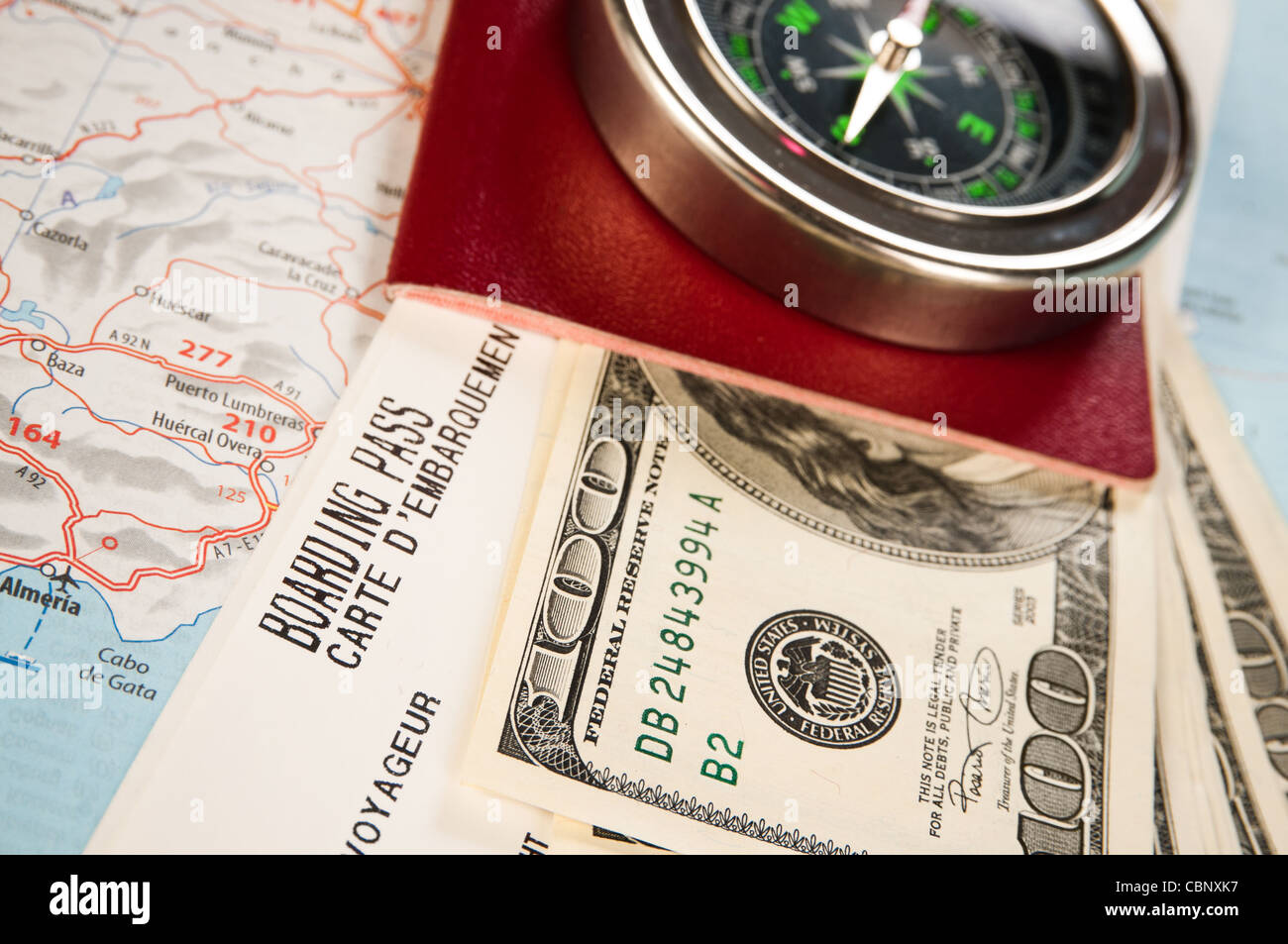 Compass Pass compass, money and passport with boarding pass Stock Photo - Alamy