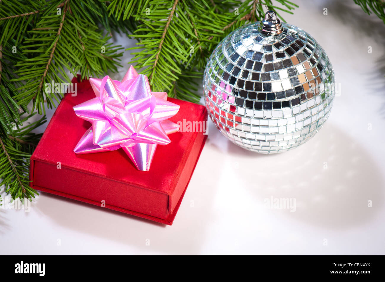 gift, disco ball and green christmas tree Stock Photo Alamy