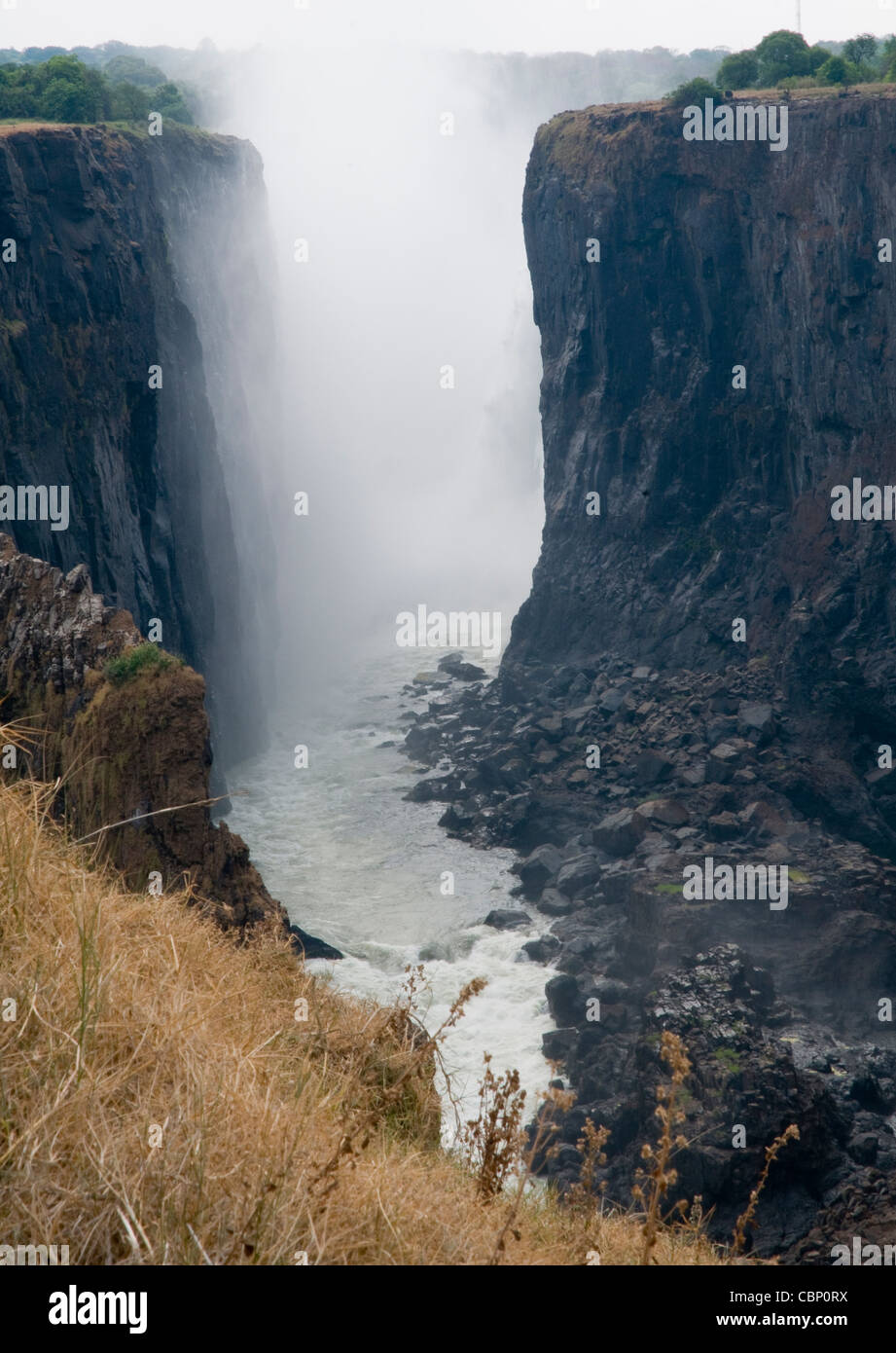 Africa Zambia-Victoria Falls from Zambia side. Zimbabwe is on the left side. Zambezi River is below Stock Photo