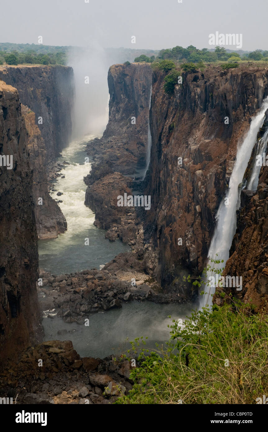 Africa Zambia-Victoria Falls from Zambia side. Zimbabwe is on the left side. Zambezi River is below Stock Photo