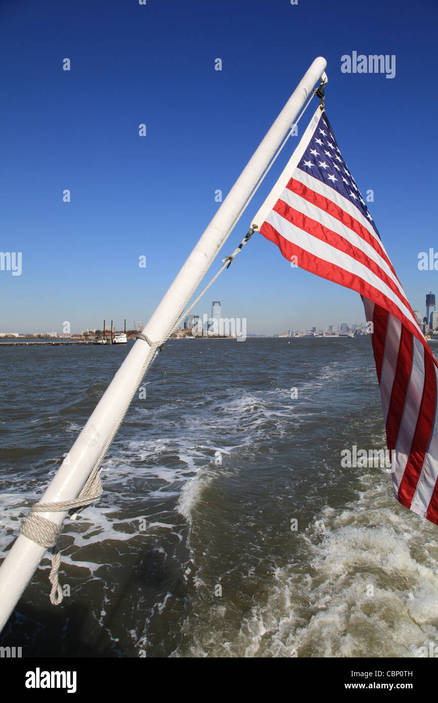 USA, View on Manhattan with US Banner (Stars and Stripes) Stock Photo