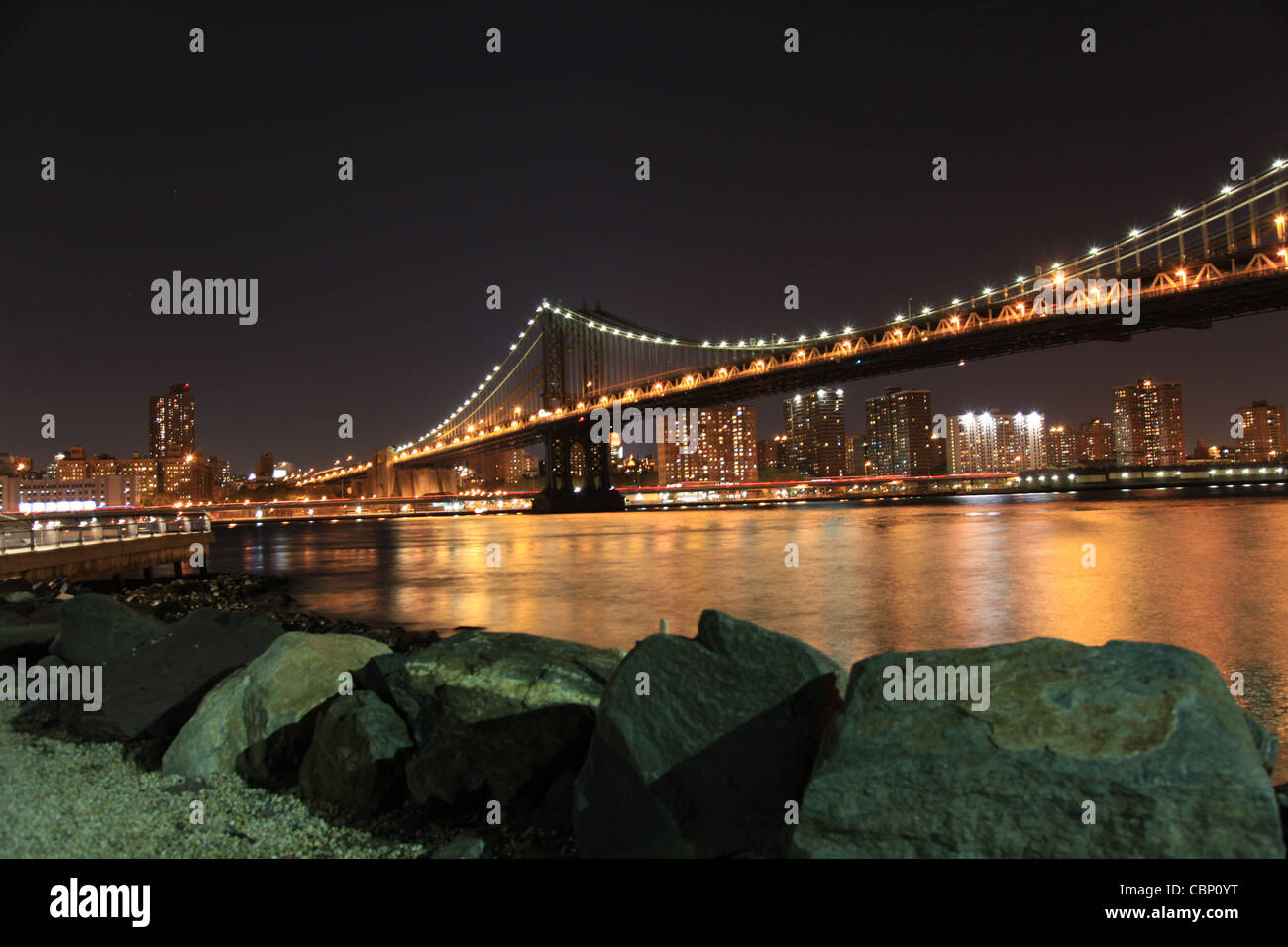 USA New York City - Brooklyn Bridge at Night Stock Photo