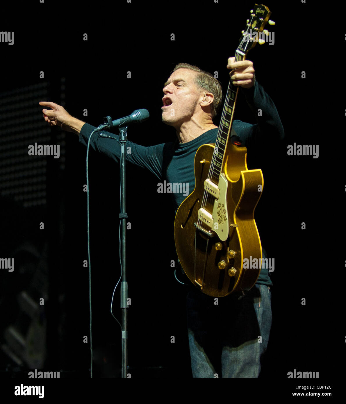 Canadian Rock Guitarist Bryan Adams performing at Cardiffs Motorpoint Arena on his 'Wake Up The Neighbors' tour. Stock Photo