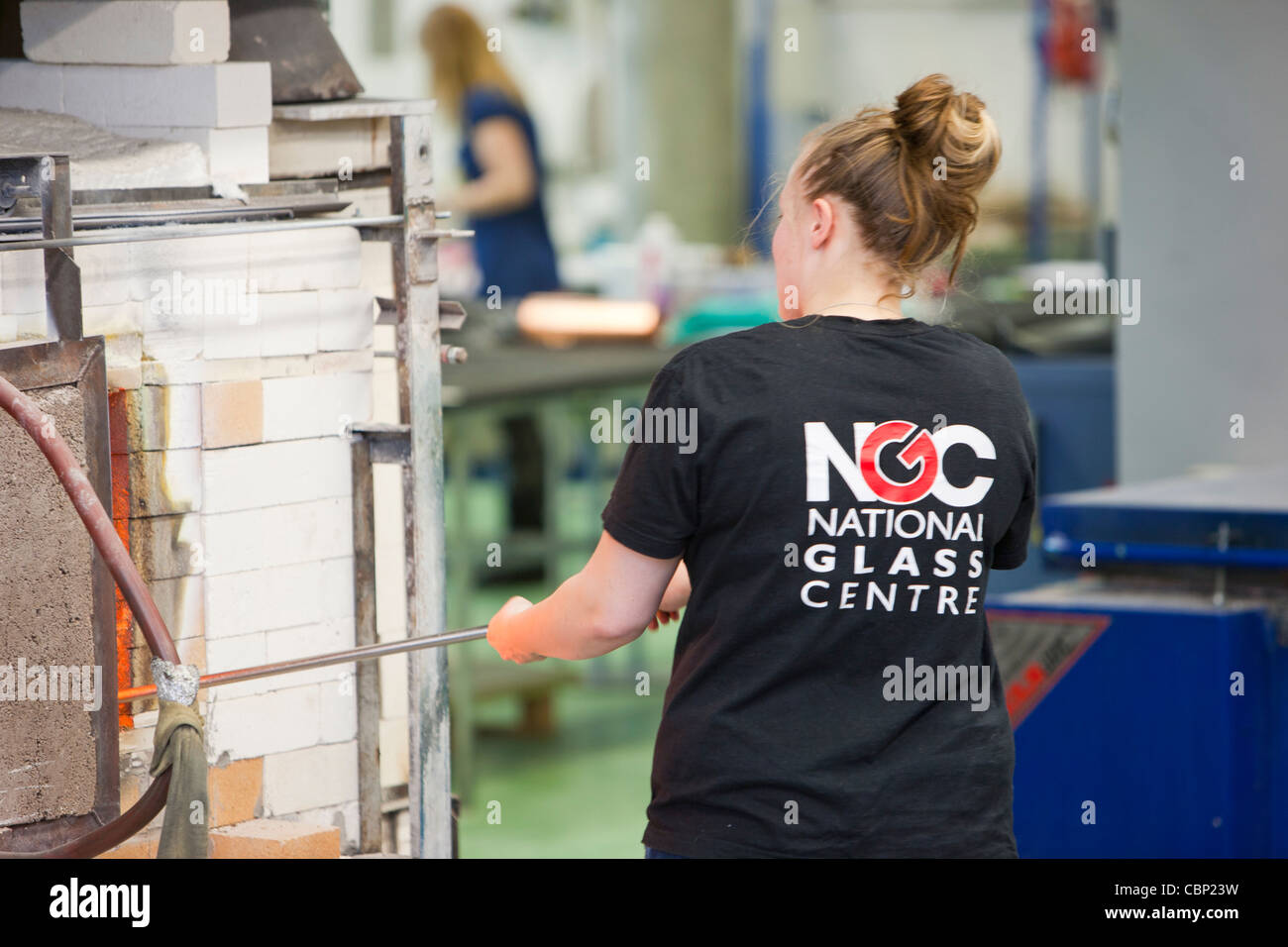 A woman blowing glass at the National Glass Centre in Sunderland, North