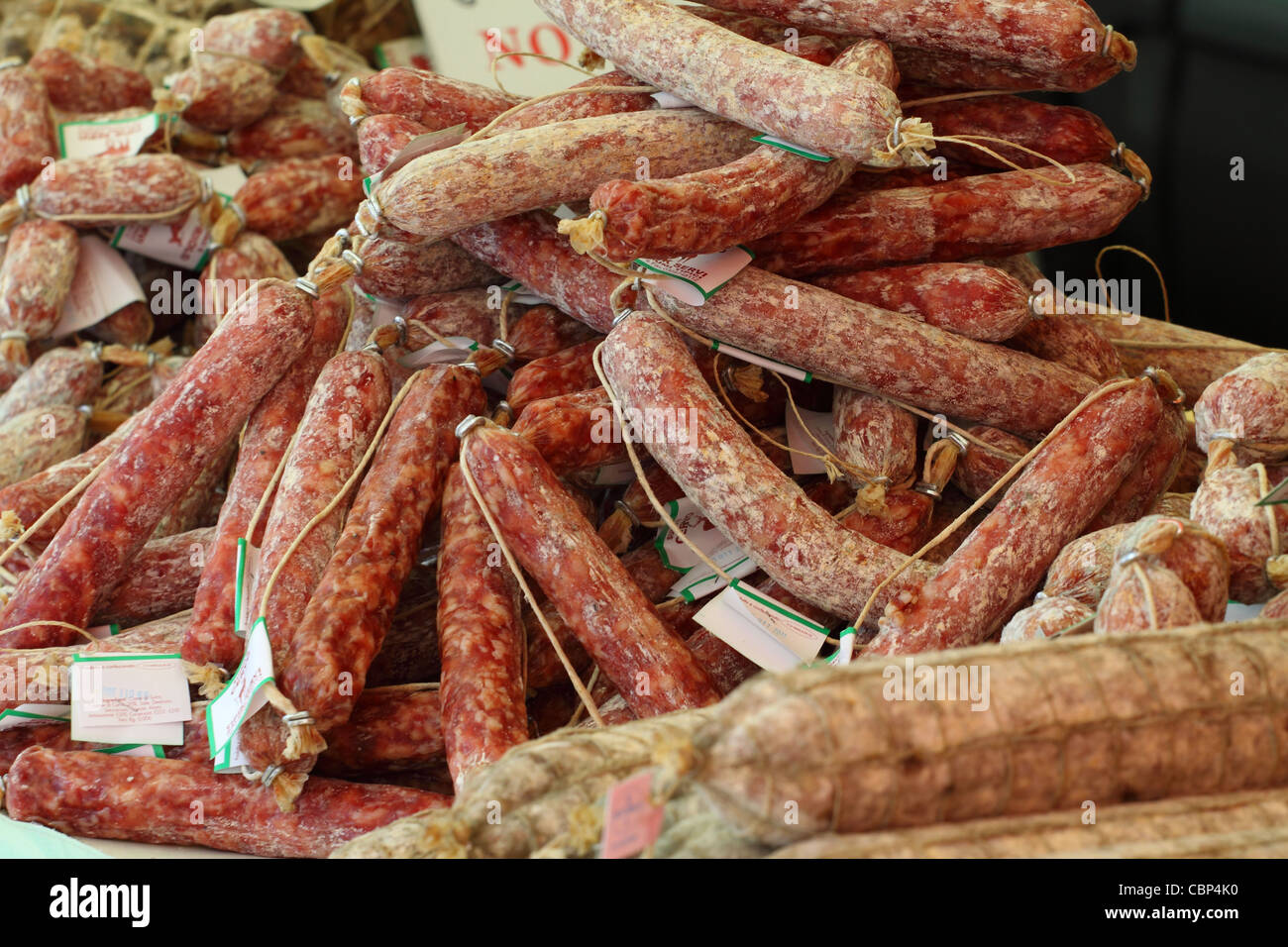 Traditional Italian sausages on display at farmer's market  Stock Photo