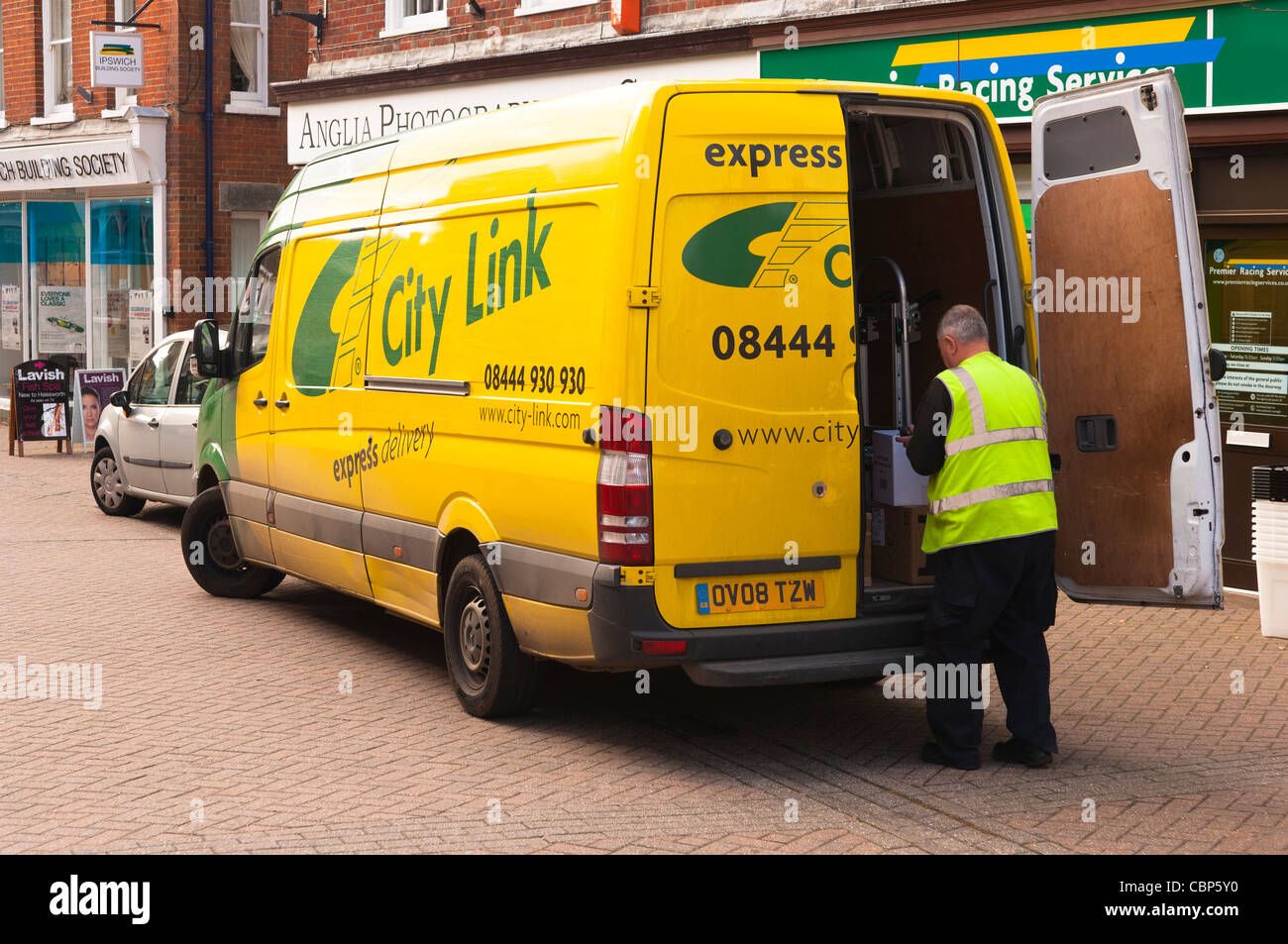 A City Link courier van delivering parcels in Halesworth , Suffolk , England , Britain , Uk Stock Photo