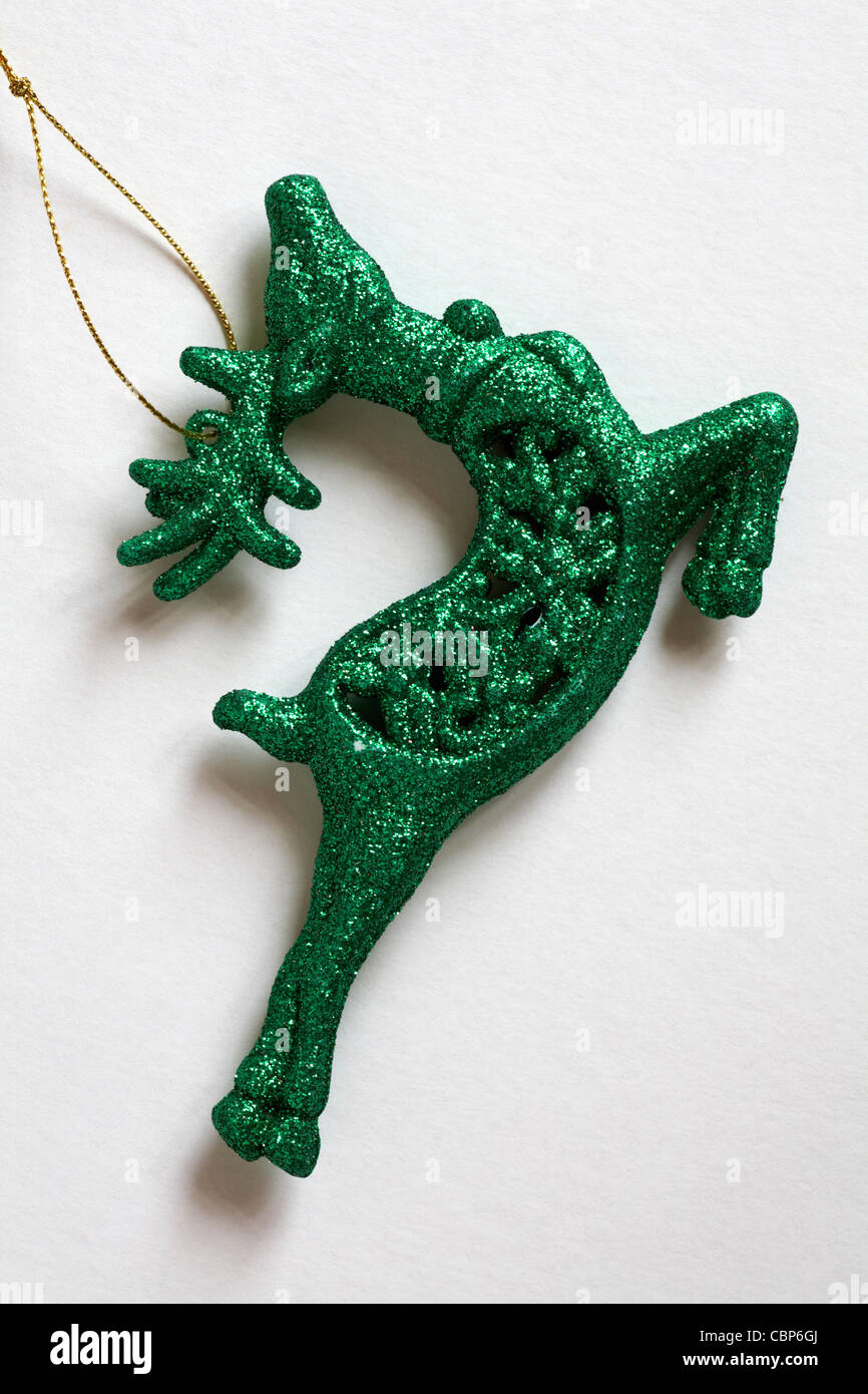 Green glittery reindeer Christmas hanging ornament isolated on white background Stock Photo