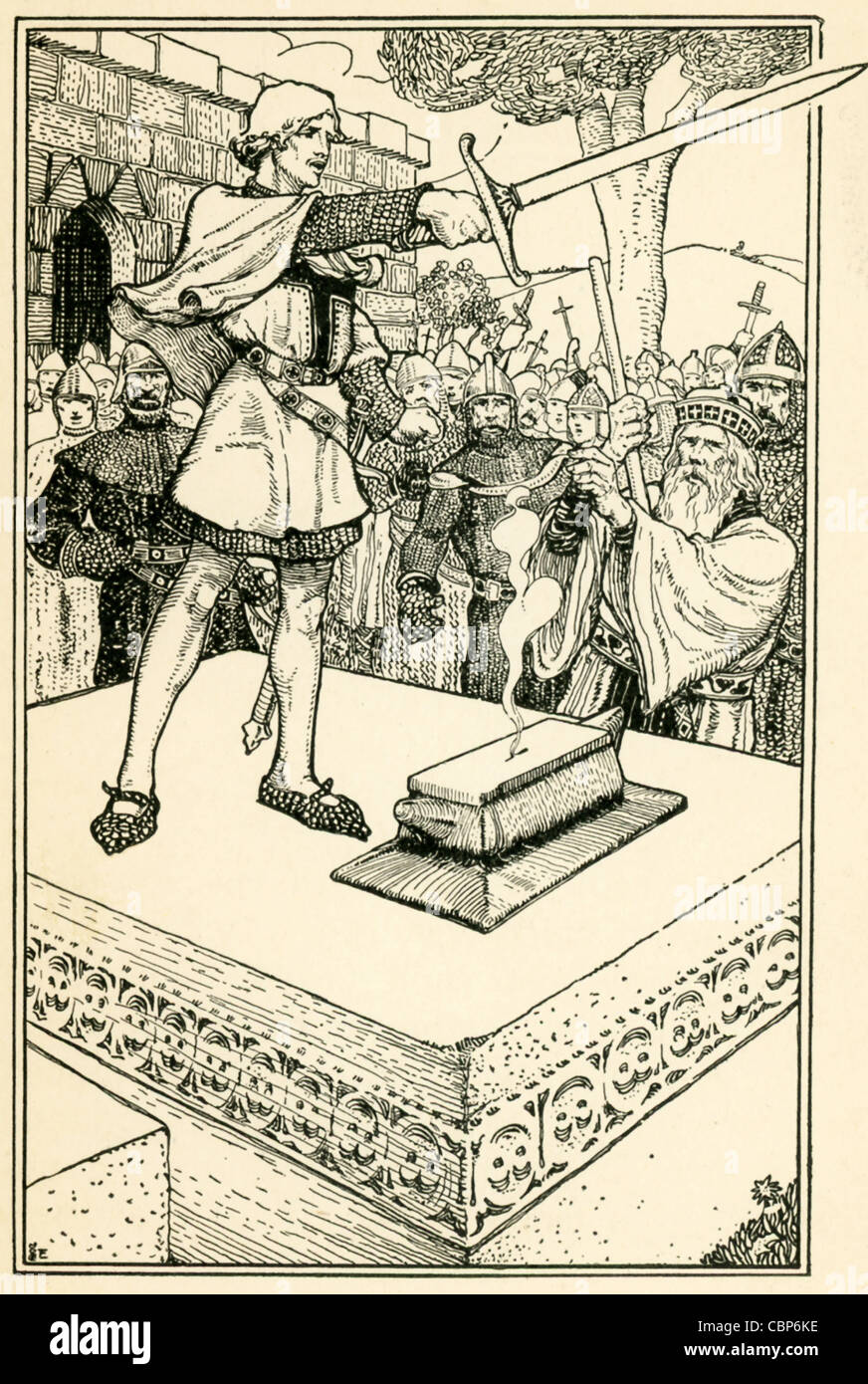 Arthur, illegitimate son of King Uther Pendragon, showing his royal blood by drawing a sword from a stone. Stock Photo
