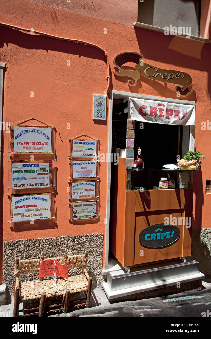 Crepes shop at a narrow alley of fishing village Porto Venere, province La Spezia, Liguria di Levante, Italy, Mediterranean sea, Europe Stock Photo
