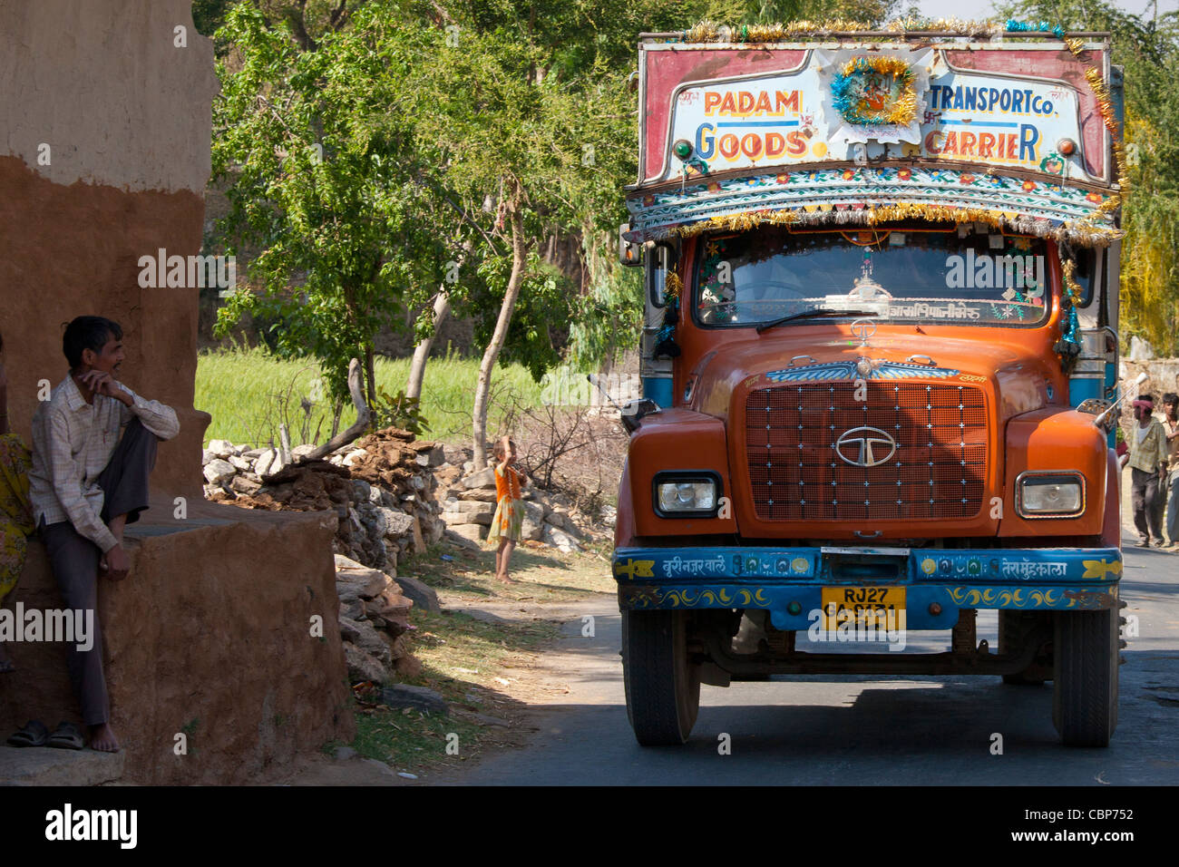 Tata truck, Padam Transport Co. goods carrier, passes through Tarpal in Pali District of Rajasthan, Western India Stock Photo