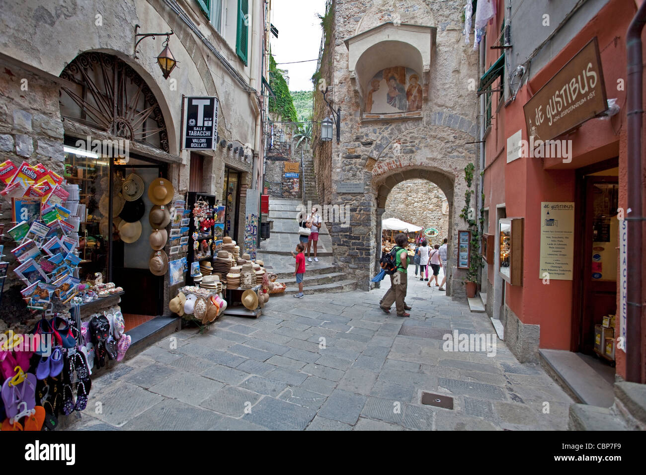 Shops and restaurants at narrow alley of fishing village Porto Venere