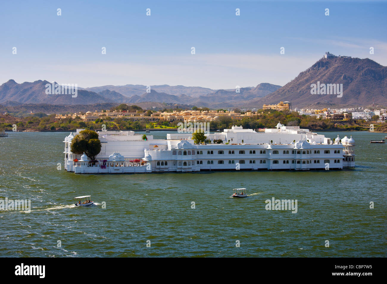 The Lake Palace Hotel, Jag Niwas, on island site on Lake Pichola in first light of early morning, Udaipur, Rajasthan, India Stock Photo