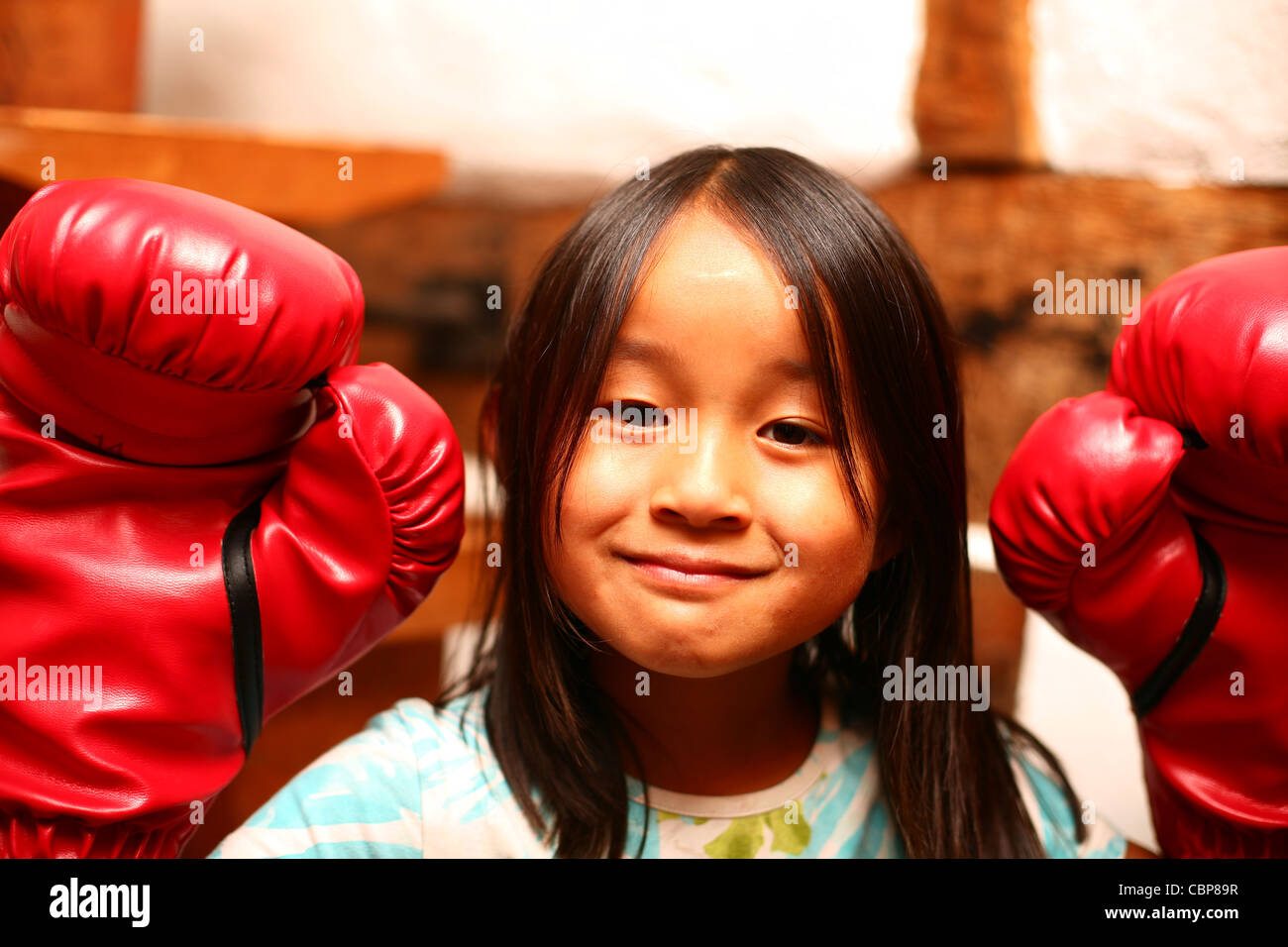 girl with boxing gloves Stock Photo
