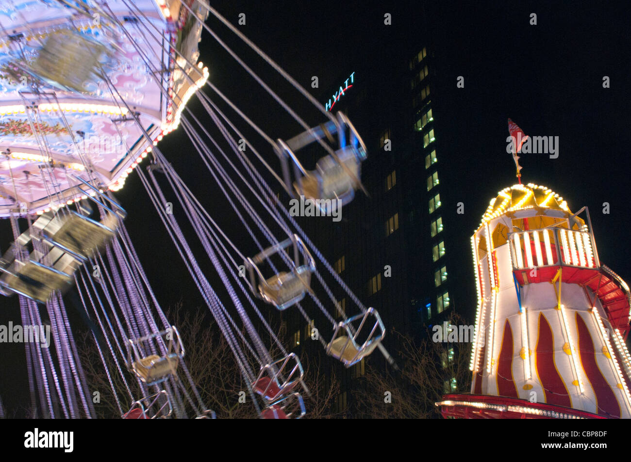 A fun fair ride in Birmingham's German Market Stock Photo Alamy