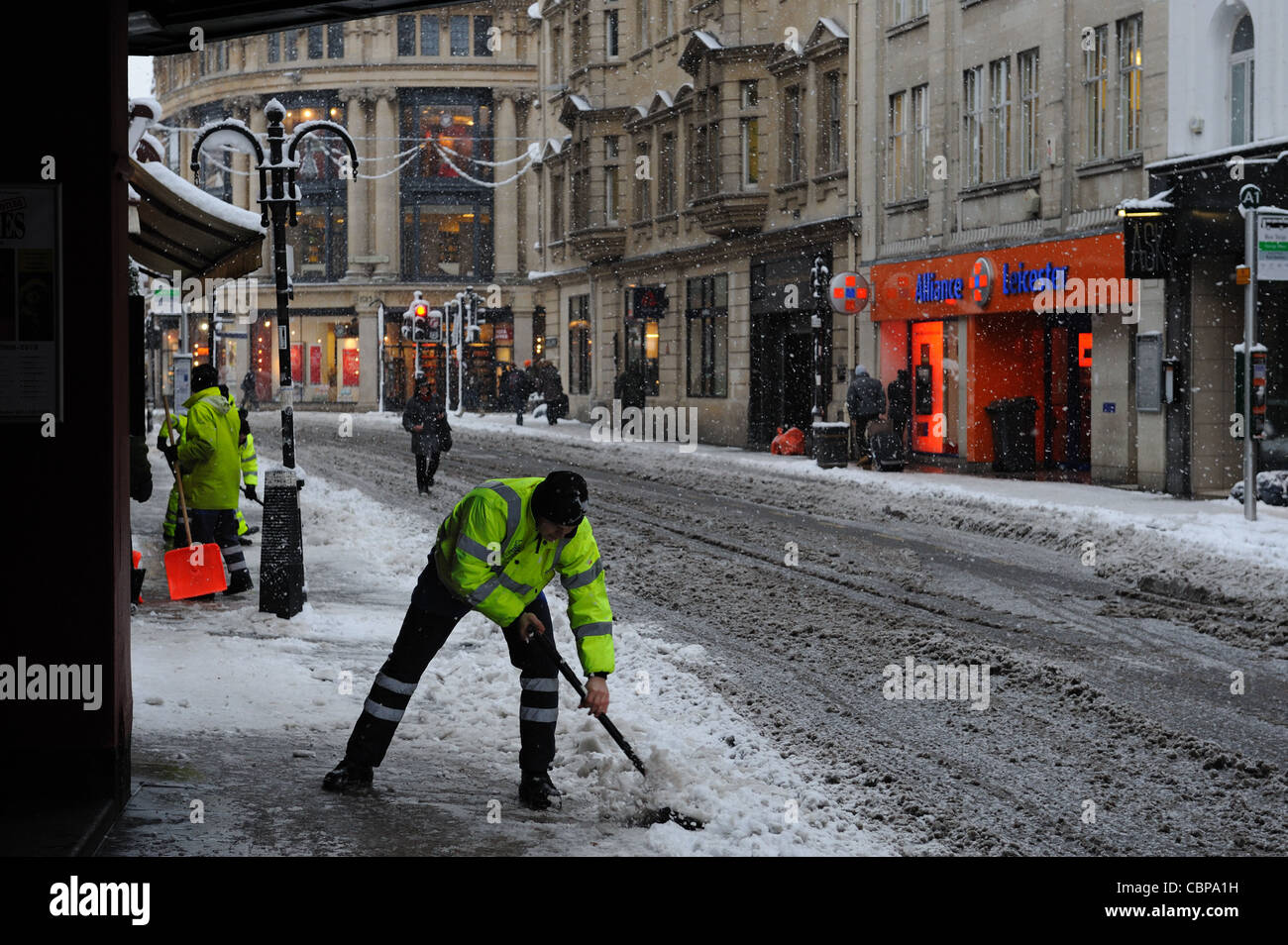 Clearing snow with a shovel in winter hi-res stock photography and ...