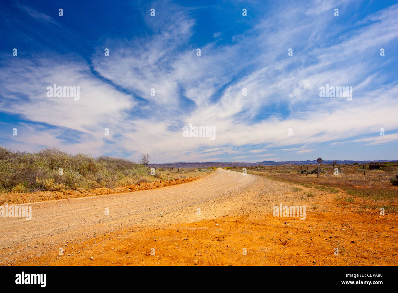 The lonely road on the Buckaringa Scenic Drive between Quorn and Hawker in the Flinders Ranges in outback South Australia, Australia Stock Photo