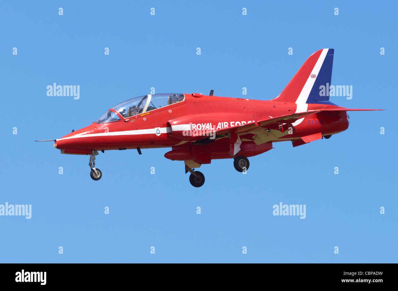 Red Arrows Hawk T1 aircraft on approach for landing at RAF Fairford, UK Stock Photo