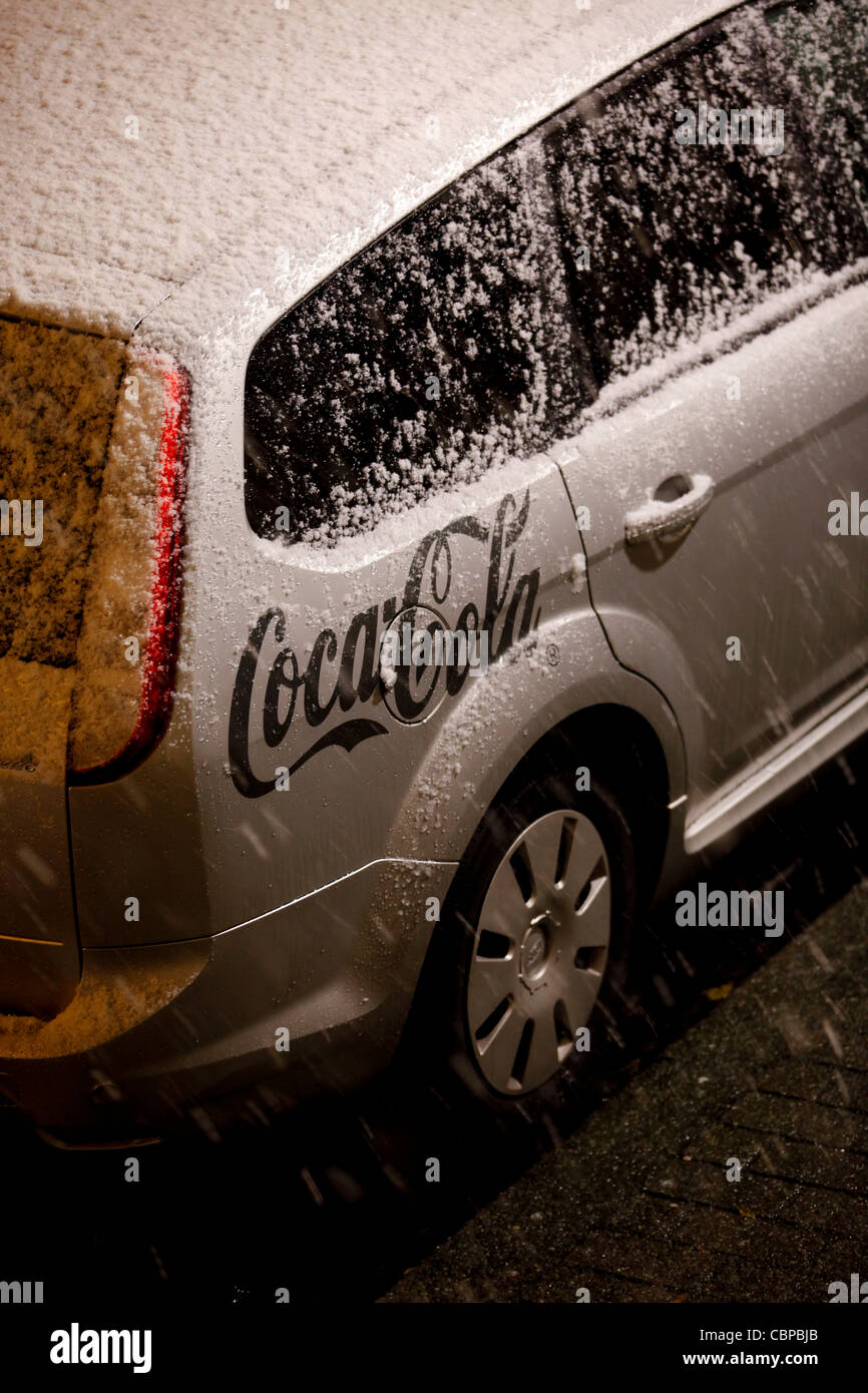Coca Cola logo and snow in a car Stock Photo