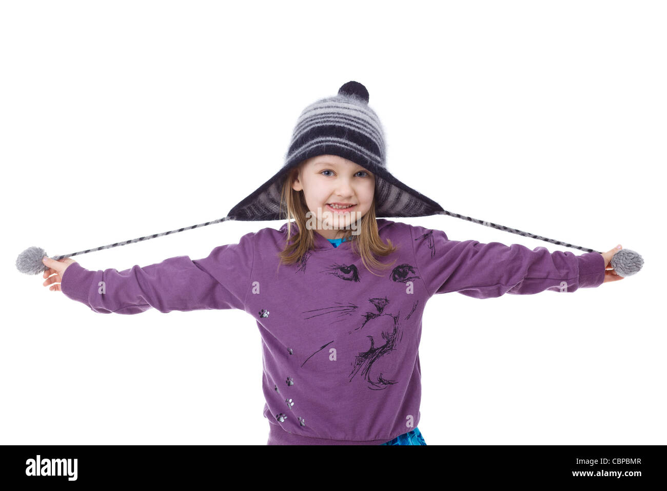 Happy girl wearing winter hat Stock Photo - Alamy