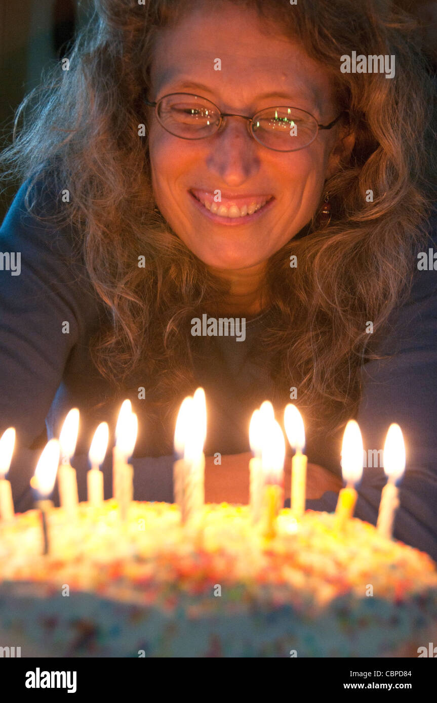 Attractive woman with birthday cake Stock Photo Alamy