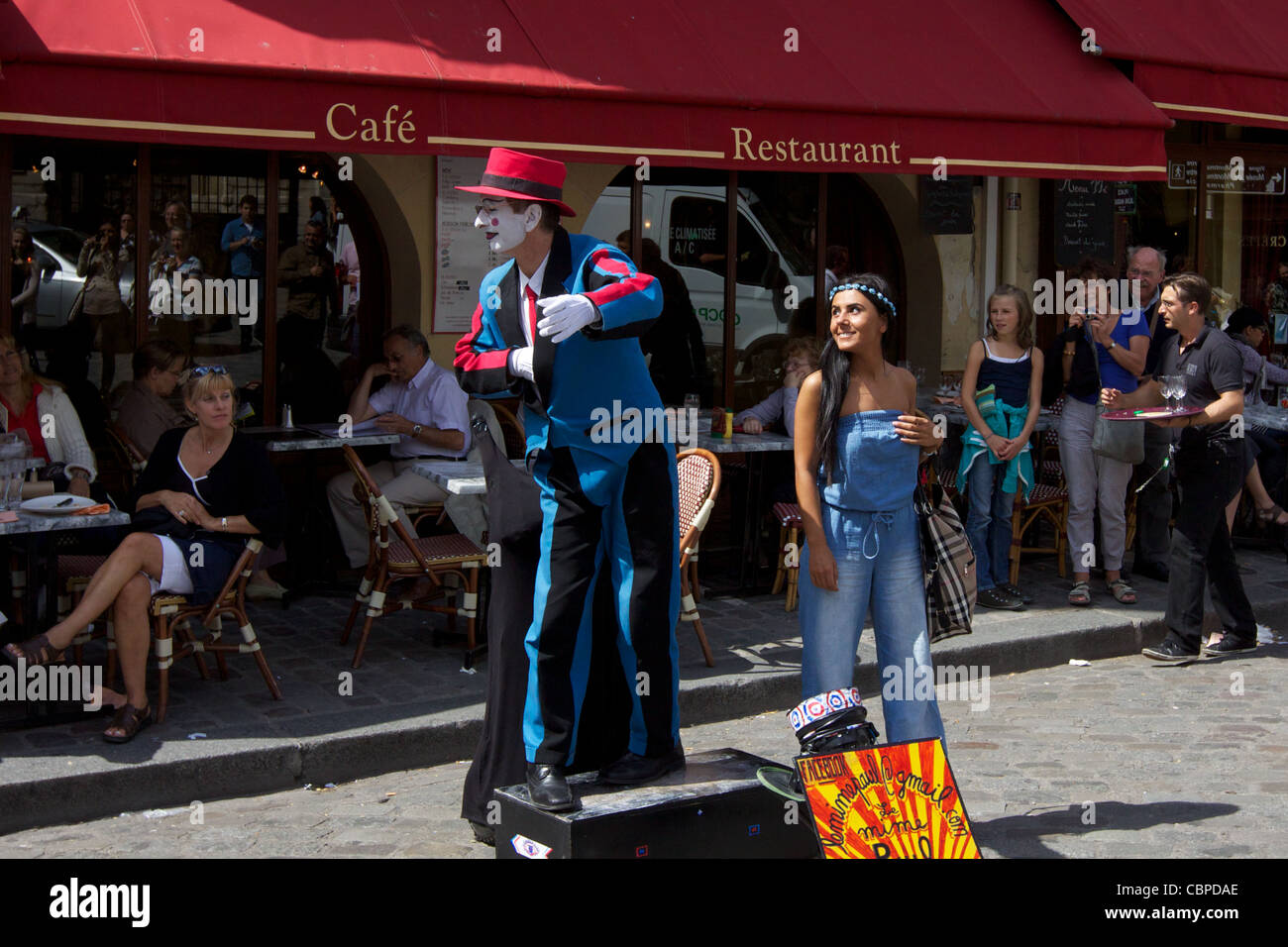 A clown entertaining tourists at Montmartre in France. Stock Photo