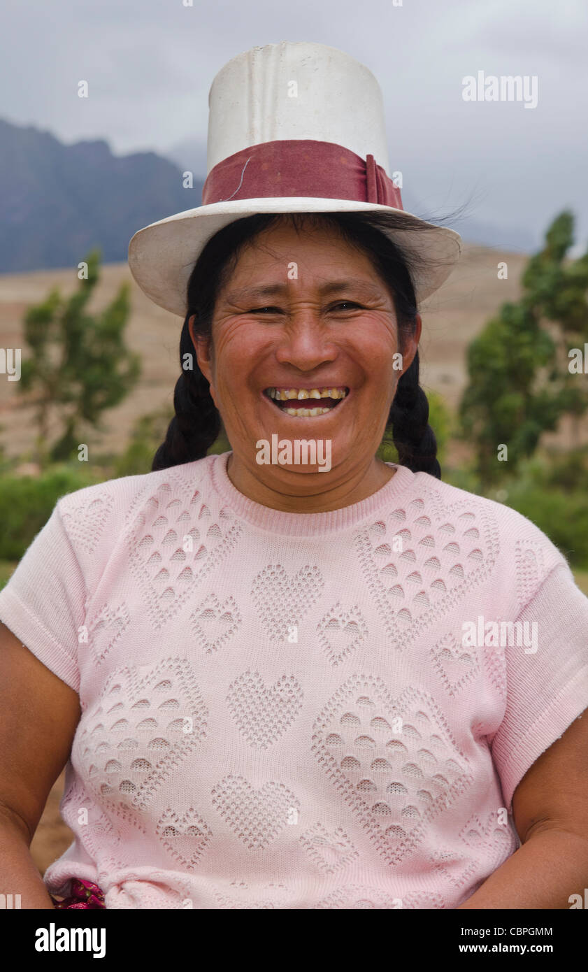 Farming images of traditional woman working with oxen on farm in small town of Chinchero Peru South America Stock Photo