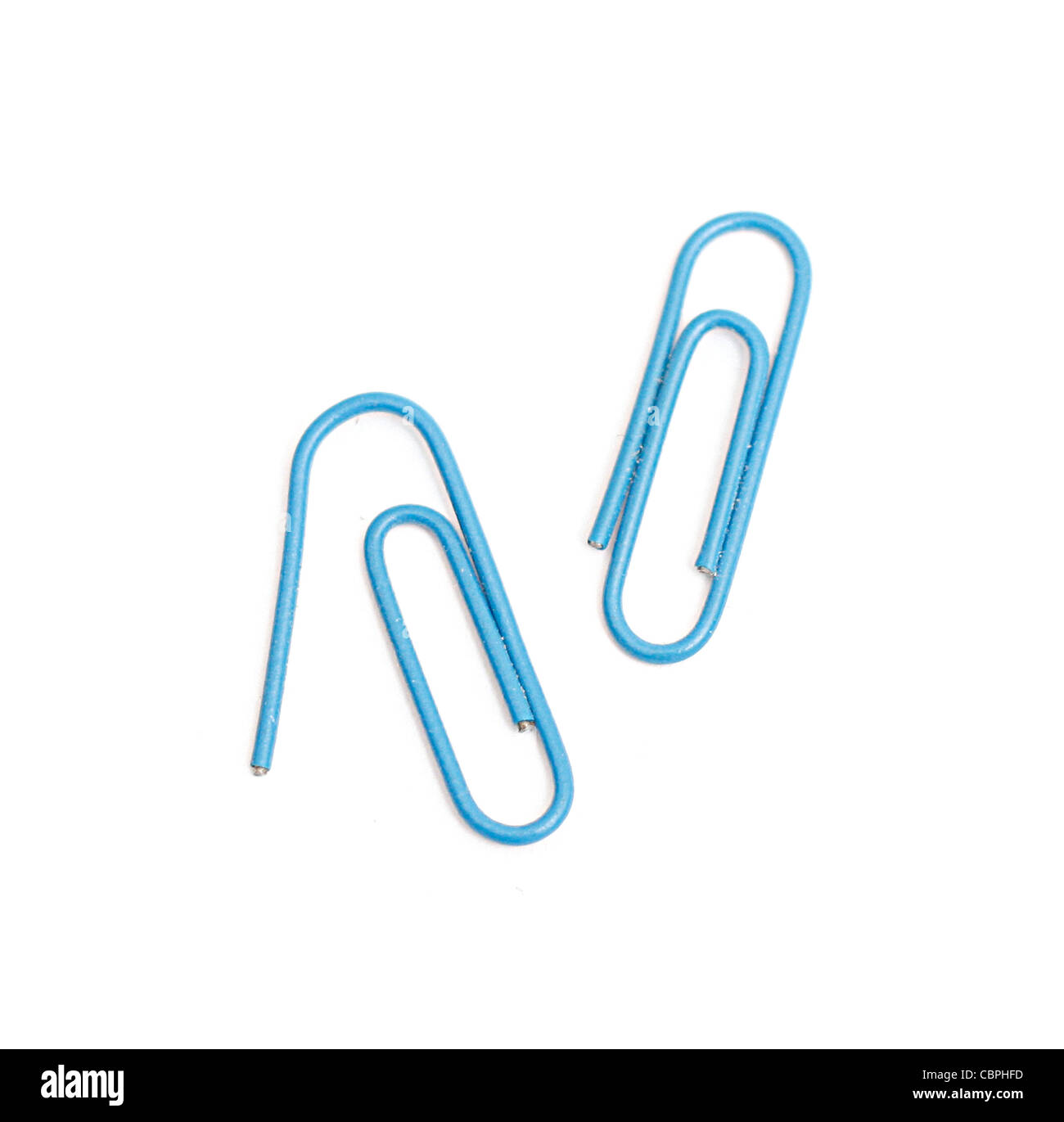 Loads of paper clips isolated on white Stock Photo