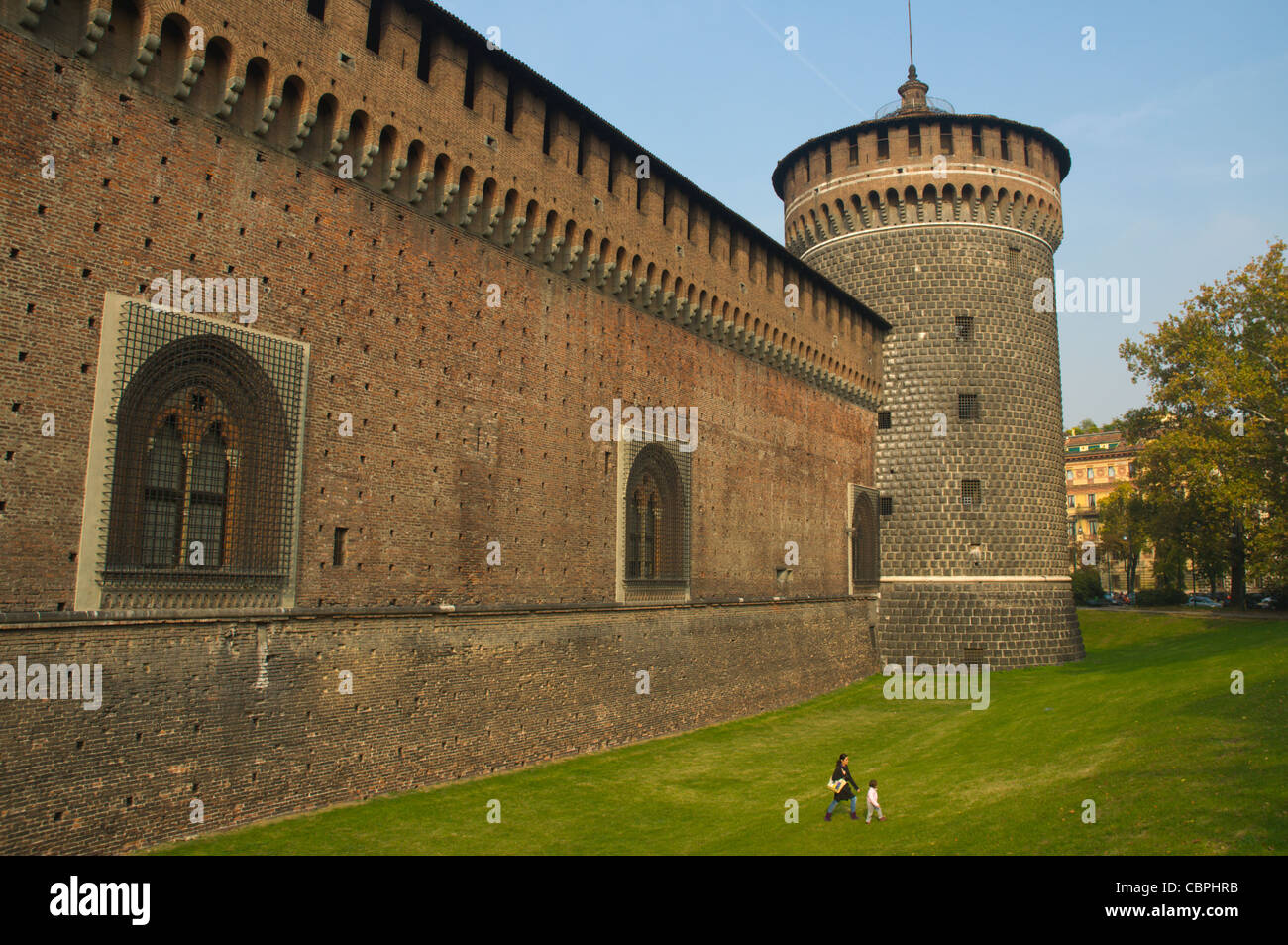 Moats dried by Napoleon in early 18th century encircling the walls of Castello Sforzesco castle Milan Italy Stock Photo