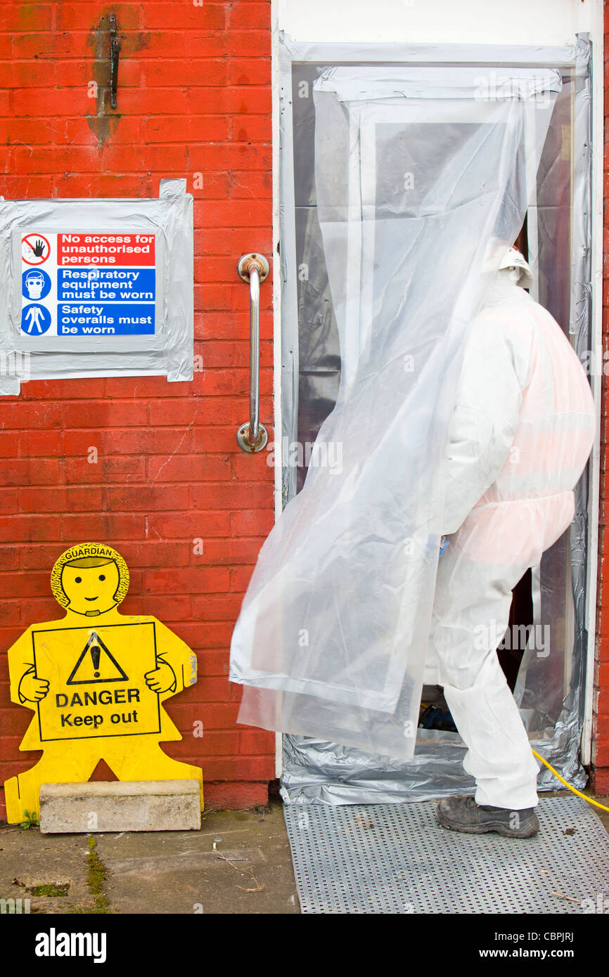 Workers removing asbestos from houses prior to demolition in Sunderland