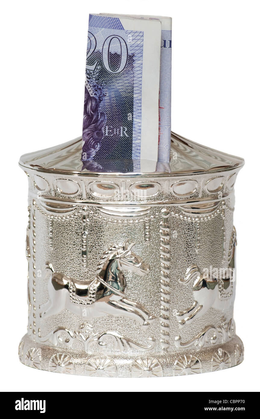 Silver Childs Childrens Christening Silver Money Savings Box With A £20 Note twenty pound note Stock Photo