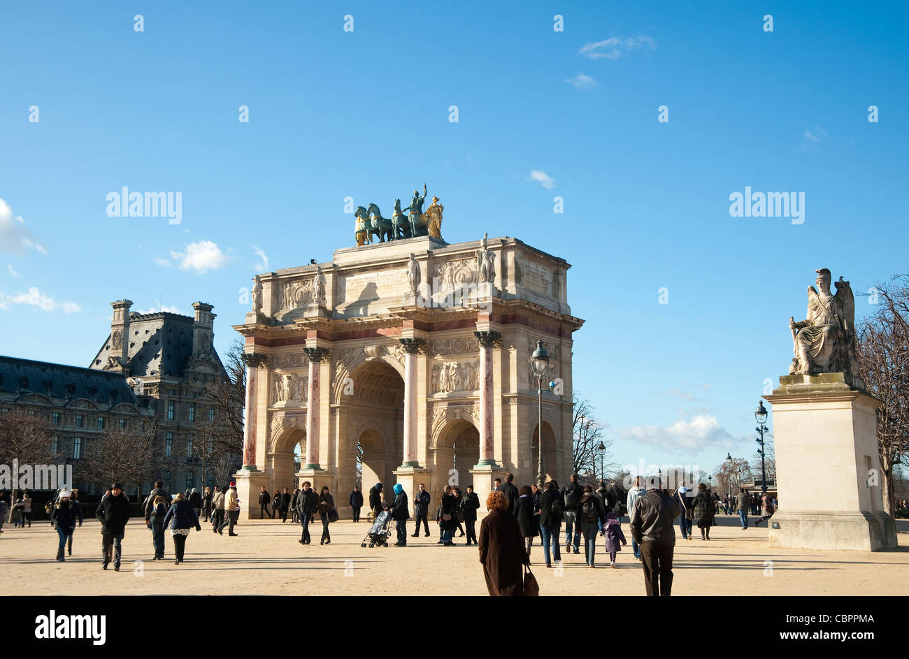 Paris, France - People during  winter day  at  Arc de Triomphe du Carrousel du Louvre Stock Photo