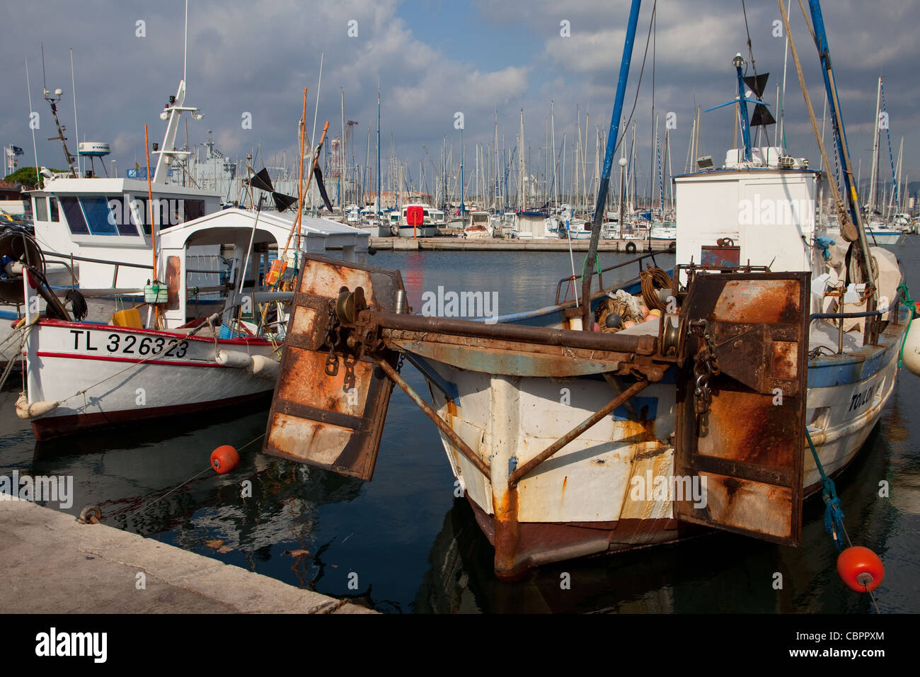 Fishing boats tied up at Toulon Harbour France Stock Photo Alamy
