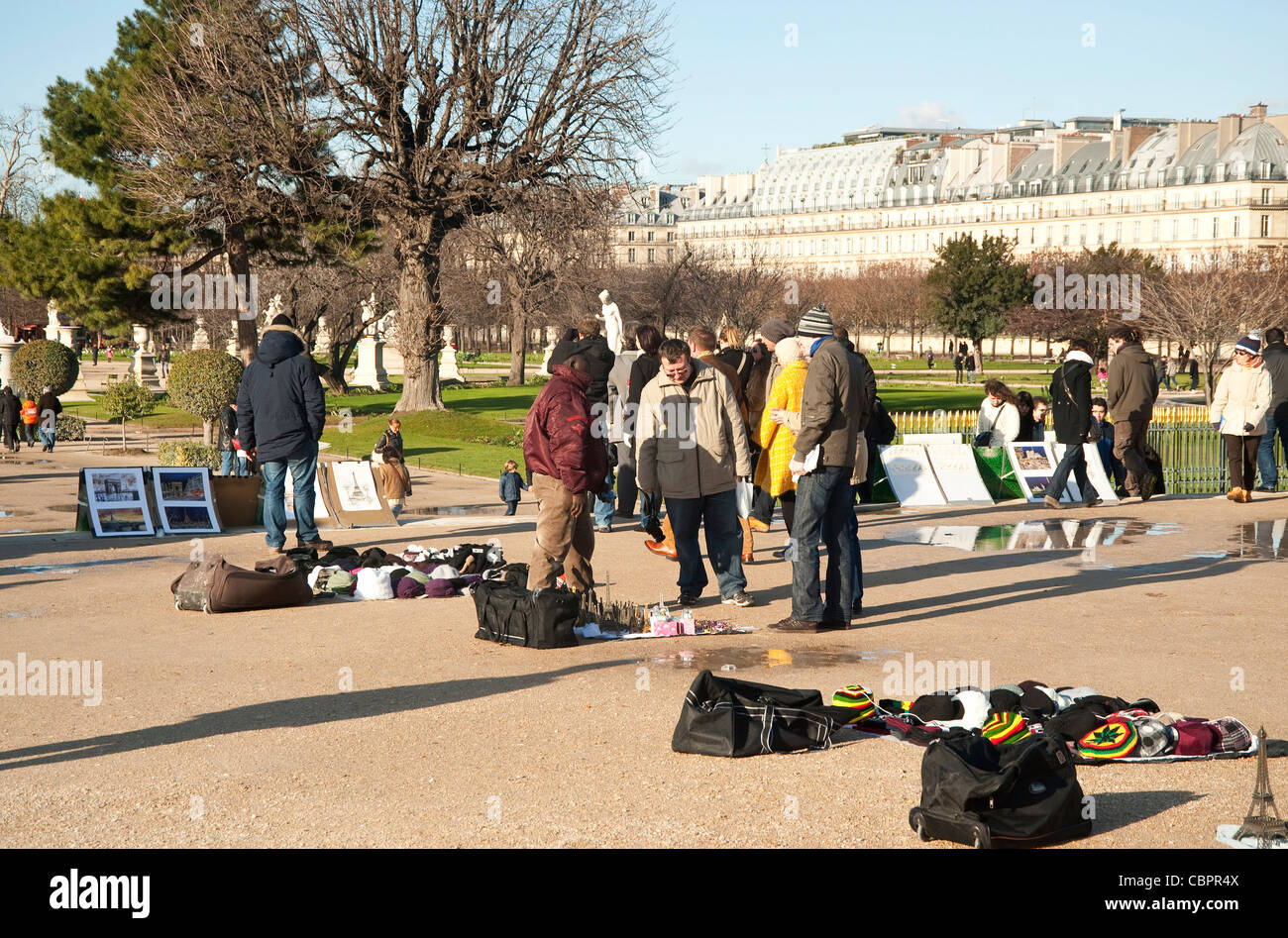 Paris France - African vendors on the streets, Jardin de Tuileries Stock Photo