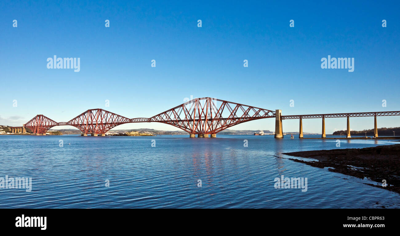 Newly painted Forth Railway Bridge as seen from South Queensferry in Scotland Stock Photo
